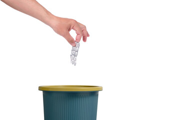 Throw package pills in trash.Isolated white background.