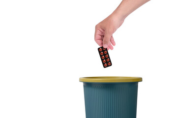 Throw package pills in trash.Isolated white background.