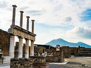 Stunning ruins of ancient city of Pompeii with volcano Vesuvius in background, Naples, Italy
