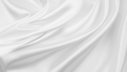 Obraz na płótnie Canvas Close-up of rippled white silk fabric texture background 