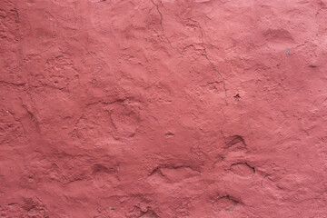 Textura de pared de cemento pintado de color rojo,  puede usar como fondo