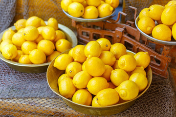 many fresh lemons in the grocery store