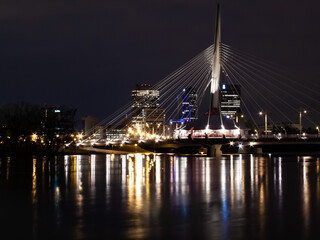 Fototapeta na wymiar night shot of Esplanade Riel pedestrian bridge Winnipeg