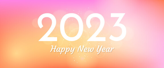 Happy new year 2023 incription on blurred background