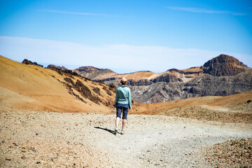 Fototapeta na wymiar woman hiking in El Teide national park Tenerife