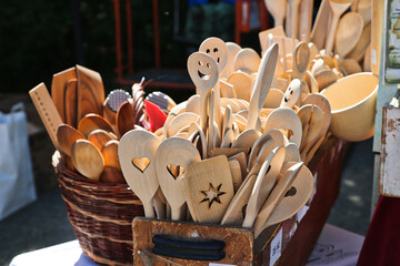 Wooden spoons sold in a stall at a farmers market