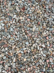 Small stone texture for background. High quality photo.
Rocks on a walk by the water.