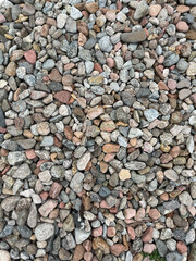 Small stone texture for background. High quality photo.
Rocks on a walk by the water.