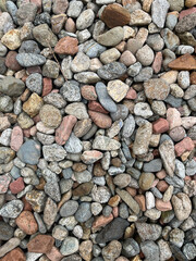 Small stone texture for background. High quality photo.
Rocks on a walk by the water.