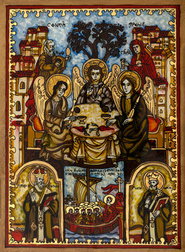 Icon painted on reverse glass in the naive orthodox style of Eastern Europe depicting the Holy Trinity.