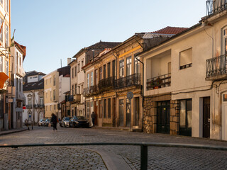 Naklejka na ściany i meble Picturesque townscape of Vila Real overlooking typical narrow streets on warm sunny spring day, Portugal .
