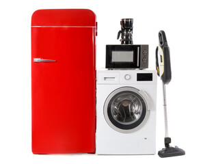 Modern household appliances on white background