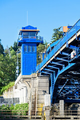 Blue control tower for the Freemont draw bridge in the Seattle neighborhood on a summer day