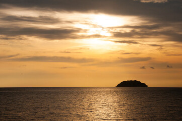 Naklejka na ściany i meble Beautiful sunset at Tanjung Aru Beach, Kota Kinabalu, Sabah, Borneo, Malaysia.