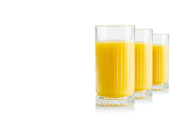 Organic Orange juice glass, isolated on white. Glass of fresh orange juice on white background