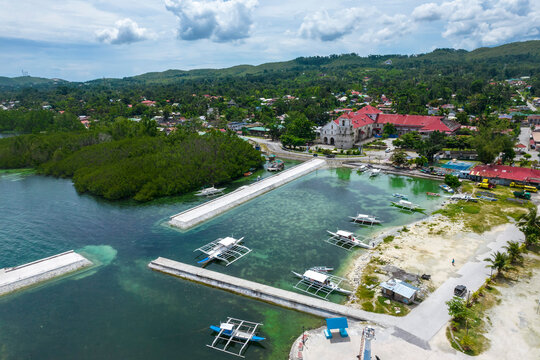 Baclayon, Bohol, Philippines - Aerial of Baclayon Church, the town center and fish port.