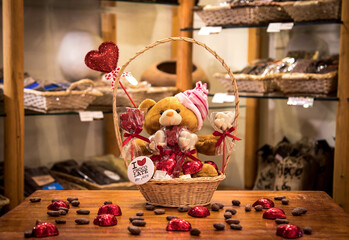 Teddy bear with chocolate, gift for Valentine's Day.