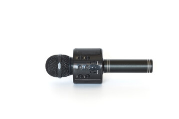 Black bluetooth microphone on white background.