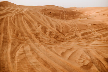 Tracks from the wheels of cars on sand dunes, racing, extreme driving