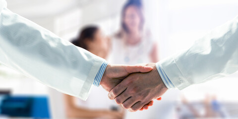 Partnership concept. Image of handshake