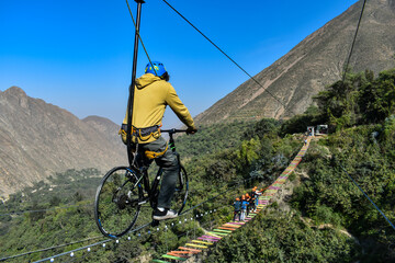 Obraz premium Aerial extreme sport, EXTREME FLYING BIKE, tourist attraction in San Mateo de Otao - Peru.