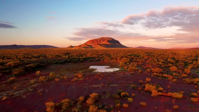 Aerial footage of sunset Mt Robinson in Karijini national park, Western Australia