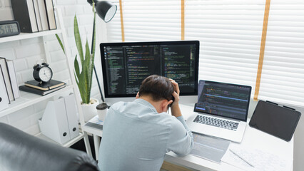 Software development concept, Male programmer is stressed after having problem with programming