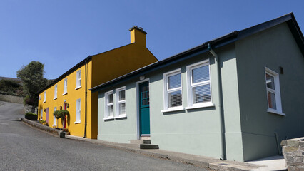 Fototapeta na wymiar Colourful painted houses on a mountain village Ireland