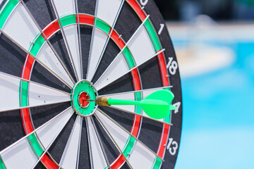 circle target for shooting on dart board aiming, to succes comes after a lot of tries