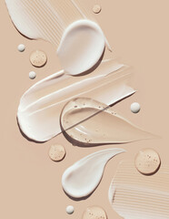 cosmetic smears of creamy texture on a pastel beige background	
 - obrazy, fototapety, plakaty