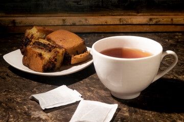 cup of tea and street food cake