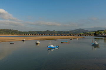 old stone bridge in San Vicente de la Barquera, Cantabria, Spain