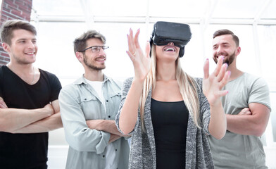Fototapeta na wymiar progressive girl smiling while wearing virtual reality glasses