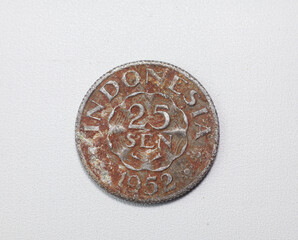 old rusty dirty coin 25 cent Indonesia year 1952