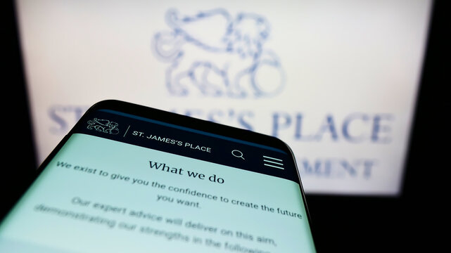 Stuttgart, Germany - 02-06-2022: Mobile phone with website of British company St. James's Place plc on screen in front of business logo. Focus on topl-left of phone display.