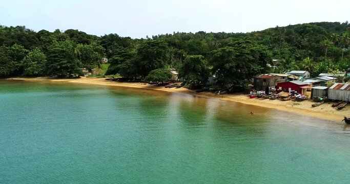 Flying backwards at abade beach.A fisherman's village at Prince Island,Sao Tome,Africa.Pr&iacute;ncipe is the world's first Biosphere Reserve by UNESCO,Sao Tome,Africa
