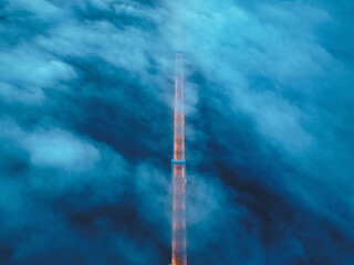 Cross-sea bridge in the fog at night