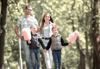 happy family standing in city Park