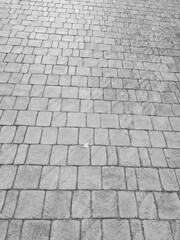 Granite cobblestone background. Paving stone texture. Pavement.