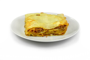 Portion of tasty lasagna, isolated on white