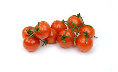 Bunch of fresh, red tomatoes with green stems isolated on white background. Clipping path.