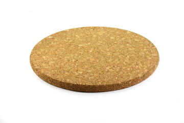 Empty round cork coaster, isolated on white background.