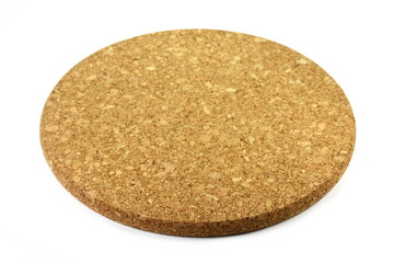 Empty round cork coaster, isolated on white background.