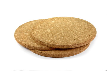 Empty round cork coaster, isolated on white background.