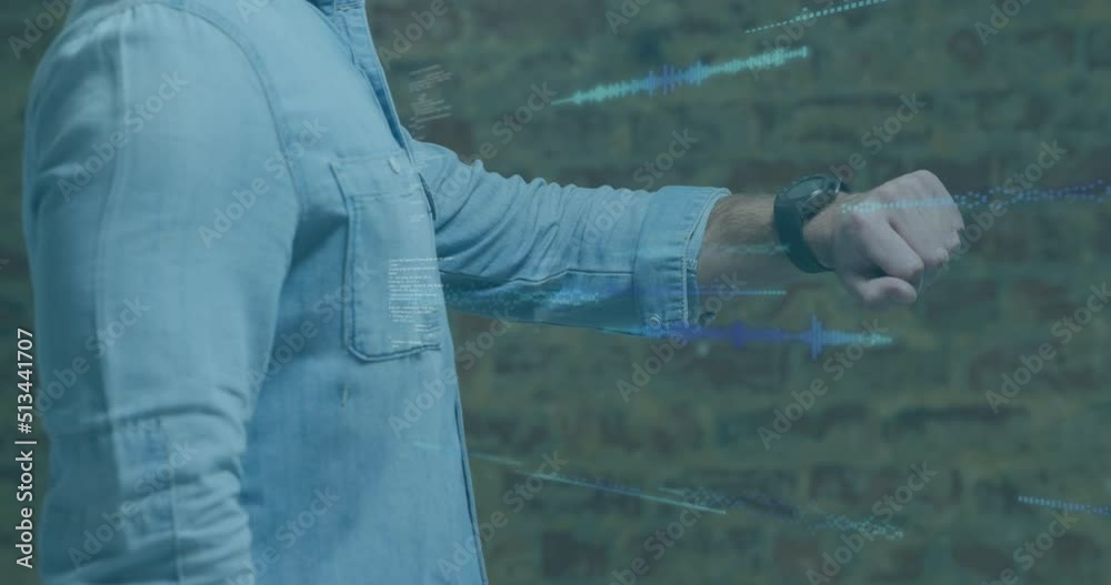 Canvas Prints Animation of data processing on screens over caucasian man checking smartwatch