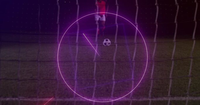 Animation of neon shapes over african american football player kicking ball at stadium