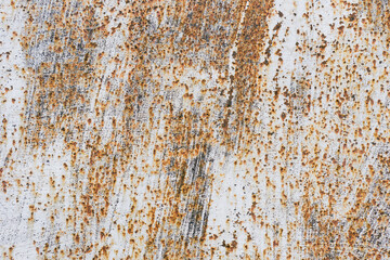Old scratched and rusty painted metal surface, background texture. Texture of metal rusty wall
