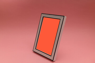 Photo frame on pink background, pedmetry