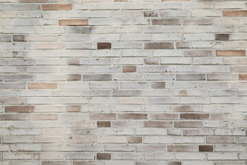 grey brick wall background with space for text, no person