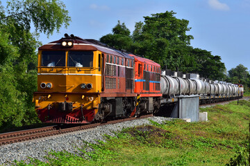 Fototapeta premium Thai tanker freight-train by diesel locomotive on the railway.
